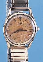 TISSOT HERRENARMBANDUHR AUTOMATIK, REF.-NR. 6548-4, SCHWEIZ UM 1954, EDELST., BODEN GESCHRMASSIV-GG-LüNETTE, STARKE GG-SCHULTERN, ...