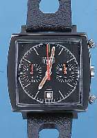 HEUER ARMBANDCHRONOGRAPH MONACO, REF.-NR. C3137-8, SCHWEIZ UM 1970, EDELST.-STüLPGEH., OBERTEIL SCHW. MATTIERT, 30-MIN.-U. 12-STD.- ...