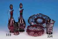DREI TEILE KRISTALL, BöHMEN, 20ER JAHRE, FARBLOSES GLAS RUBINROT üBERFANGEN, GESCHNIT- TEN UND GESCHLIFFEN, PAAR KARAFFEN, H. CA. 39 CM, EIN ...