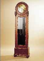 STANDUHR MIT WESTMINSTERSCHLAG, DEUTSCH, UM 1925/30, EICHENGEHäUSE VERZIERT U. GE- SCHNITZT, SEITLICH ABGESETZTE HALBSäULEN, ...