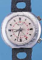ZUREX ARMBANDWECKER, SCHWEIZ UM 1970, MAS- SIV MESSING VERCHR., EDELST.-BODEN GESCHR., 17 ST., SCHWEIZER STIFTENANKERW., GEH.-U. WECK-WERK ...