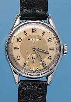MOVADO HERRENARMBANDUHR SPORT, REF.-NR. 18127, SCHWEIZ UM 1958, METALL NACHVERCHR., EDELST.-SCHR.-BODEN, 2-FARB. VERS. BLATT L. FL., 17 ST., ...