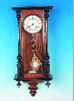 WANDUHR, DEUTSCH, UM 1880, VERZIERTES HOLZGEHäUSE SCHWARZ ABGESETZT, DREISEITIG VERGLAST, AUFSATZ FEHLT, ZWEIGE- TEILTES ...