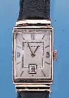 LE COULTRE HERRENARMBANDUHR, REF.-NR. 534750SCHWEIZ/USA UM 1946, ROSE-G.-FILLED GEH. M. VERD. BANDANST., BODEN GEDR., REST. BLATT, ALTERSBED. ...