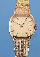 UERTINA DAMENGOLDBANDUHR, REF.-NR. 800/5258/68, SCHWEIZ UM 1982, GG 750/000 INCL. GG- FLECHTBAND, BODEN GEDR., SATIN. VERG. BLATT, QUARTZWERK, ...