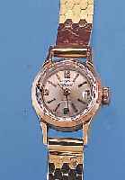 TISSOT DAMENGOLDBANDUHR, REF.-NR. 7769, SCHWEIZ UM 1962, GG 750/000-RUNDGEH. INCL. GG-WABENGLIEDERB., BODEN GEDR., BOMB. MINERAL-GL. M. ...