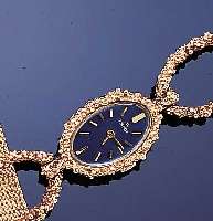 TISSOT DAMENGOLDBANDUHR, REF.-NR. 6757, SCHWEIZ UM 1970, GG 585/000 INCL. GG-GLIEDER- BAND IM NUGGETDESIGN, BODEN GEDR., ANKERFORM- WERK VERG., ...