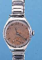 LONGINES HERRENARMBANDUHR, REF.-NR. 5114999,SCHWEIZ UM 1930, 925ER SILBER, TONNENFORM, VERS. BLATT FL., GEBL. STAHLZEIGER, BODEN U. GLASR. ...
