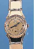 OMEGA DAMENARMBANDUHR, SCHWEIZ UM 1929, GG 585/000, HANDGEARB. GG 585/000-GLIEDERBAND SPäTER, BODEN U. GLASR. GEDR., BLATT REST., GEBL. ...