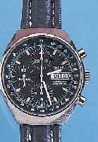 HEUER ARMBANDCHRONOGRAPH MONTREAL, REF.-NR. 1020/750-503, SCHWEIZ UM 1976, EDELST., BODEN GESCHR., MINERALFLACHGL., SCHW. KONTRASTZIF- FERBL., ...