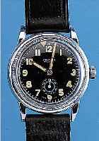 UNION S.A. FLIEGERARMBANDUHR SOLEURE, SCHWEIZ UM 1936, METALL HARTVERCHR., EDELST.- BODEN U. DREHLüNETTE GEDR., SCHW. ORIG.-KON- ...