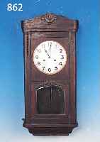 WANDUHR MARKE PFEILKREUZ, UM 1920, EICHENHOLZGEHäUSE, SCHWUNGBEREICH DES PENDELS VERGLAST, MESSINGZIFFERBLATT VERSILBERT (ZIF- FERN ...