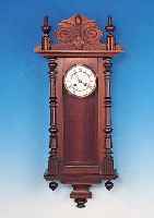 WANDUHR, MüLLER & CO. MüHLHEIM A.D., VERZIERTES HOLZGEHäUSE, AUFSATZ SEK., DREISEI-TIG VERGLAST, ZWEIGETEILTES EMAILZIFFERBLATT, MASS. ...