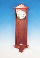 WANDUHR, SPäTBIEDERMEIER, PRAG, UM 1830/40, SCHLICHTES EICHENHOLZGEHäUSE IN ZEITTYP. FORM,DREISEITIG VERGLAST, AUFSATZ IN DACHFORM (Z.T.REST.), ...