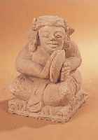 SKULPTUR, INDONESIEN, 20. JH., KALKSTEIN, REICH GEHAUEN, SITZENDE FRAU, H. CA. 44 CM