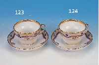 TASSE MIT UNTERTASSE, KPM BERLIN, UM 1910, PORZELLAN, BUNTE BEMALUNG, PART. HELLGRüNER FOND, FLORALE BEMALUNG, GOLDSTAFFAGE, DIESE L. BER., ...