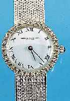 DAMENGOLDBANDUHR, SCHWEIZ UM 1968, WG 750/ 000-GEH. INCL. WG-FLECHTBAND RODH., AUFWEND. LüNETTE M. 32 8/8 DIAMANTEN ZUS. CA. 0,5 CT WEIß/VSI, ...