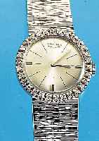 LONGINES DAMENGOLDBANDUHR, SCHWEIZ UM 1968, NEUTR. WG 750/000-GEH. RODH., AUFWEND. LüNETTEM. 30 8/8 DIAMANTEN ZUS. CA. 0,35 CT WEIß/VSI,BODEN ...