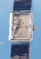 DUGENA HERRENARMBANDUHR, DEUTSCHLAND UM 1948METALL VERCHR., SONDERANFERT. WOHL AUF KUNDEN-WUNSCH, BEIDS. VERGL. RECT.-FORM, ZIFFERBL. ERS., 15 ...