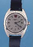 OMEGA DAMENARMBANDUHR MEGAQUARTZ, REF.-NR. 596-0004, SCHWEIZ UM 1975, EDELST. MASSIV, BODEN GESCHR., DATUM, KAL. 1320, EINER DER ERSTEN IN ...