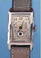 ARCTOS HERRENARMBANDUHR, FüR DEN DEUTSCHEN MARKT, UNGETR. LAGERW., UM 1940, EDELST.- RECT.-FORM, BODEN GEDR., ZIFFERBL. LAGERSP., ...