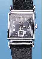 VIMY HERRENARMBANDUHR ART DECO, SCHWEIZ UM 1940, METALL CARREE-GEH. HARTVERCHR., BET. SCHARNIERBANDANST., ZIFFERBL. ANTHRAZITFARB., 15 ST., ...