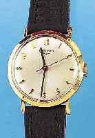 LONGINES HERRENARMBANDUHR, REF.-NR. 072611, SCHWEIZ/USA UM 1962, GG-FILLED, GLASR. GEDR., VERS. ORIG.-BLATT M. AUFGES. GOLDSTD.-ZEICHEN,LEDERB. NEU, ...