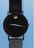MOVADO HERRENARMBANDUHR MUSEUMS WATCH, REF.-NR. 87-40-882N, SCHWEIZ UM 1988, FLACHES EDEL-ST.-GEH. SCHW. MATT., SAPHIRVERGL. üBER GES. DURCHM. ...