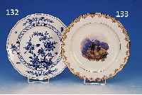 ZIERTELLER, MEISSEN, UM 1890, PORZELLAN, MIT STEINBöCKEN BEMALT, GOLDSTAF- FAGE, D. 25 CM