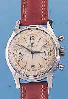 WITTNAUER ARMBANDCHRONOGRAPH, REF.-NR. 3256, SCHWEIZ UM 1966, EDELST., BODEN GESCHR.,VERS. ORIG.-BLATT FL., 30-MIN.-STOPPZäHLER, TELE- U. ...