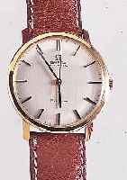 OMEGA HERRENARMBANDUHR GENEVE, REF.-NR. 161-033, SCHWEIZ UM 1964, GG 750/000, BODEN U. GLASR. GEDR., VERS. BLATT, AUFGEL. GG-STD.- ZEICHEN, AUF ...