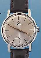 OMEGA HERRENARMBANDUHR, REF.-NR. 135/070, SCHWEIZ UM 1963, EDELST. GESCHR., BLATT REST.,VERG. WERK, 17 ST., HANDAUFZUGKAL. 268, 4- SCHENKL. ...
