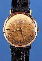 DUGENA HERRENARMBANDUHR PRECISION, REF.-NR. 31417, SCHWEIZ UM 1960, GG 750/000, GLASR. GEDR., FLACHE AUSF., MATT. BLATT M. AUFGES. ...