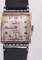 ELECTION HERRENARMBANDUHR, 40ER JAHRE, SCHWEIZ, RG 750/000 CARREEGEH., BEWEGL. BAND- ANST., BOD. AUFGEDR., VERS. ORIG.-BLATT LT. FLECK., ...
