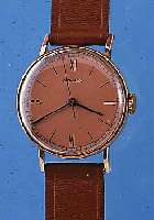 MOVADO HERRENARMBANDUHR, REF.-NR. 62742, SCHWEIZ UM 1940, METALL M. 20 MICRON ROSE-G.- AUFL., BODEN U. GLASR. GEDR., KUPFERFARB. ORIG.-BLATT, ...
