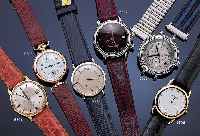 FORGET HERRENARMBANDUHR CHRONOMETER, SCHWEIZUM 1991, EDELST., TEILW. POL., BEIDS. SAPHIR- VERGL., GUILL. U. VERS. BLATT, MODERNE VOLL- KALENDERANZ. ...