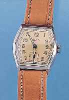 KONVOLUT: 2 JUNGHANS HERRENARMBANDUHREN, UNGETR. LAGERW., UM 1939, BEIDE TONNENFORM, EDELST., BODEN GEDR., ZEITIDENT. LEDERB., VERS. ...