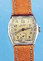 KONVOLUT: 2 JUNGHANS HERRENARMBANDUHREN, UNGETR. LAGERW., UM 1939, BEIDE TONNENFORM, EDELST., BODEN GEDR., ZEITIDENT. LEDERB., VERS. ...