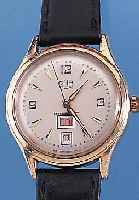 GUB HERRENARMBANDUHR, REF.-NR. 50247, DEUTSCHLAND UM 1959, METALL M. GG-AUFLAGE, EDELST.-BODEN GEDR., SELTENE TAG U. DATUM- ANZ. DURCH ...