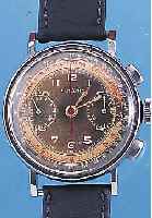 LEMANIA ARMBANDCHRONOGRAPH, REF.-NR. 61332, SCHWEIZ UM 1940, EDELST., GR. AUSF., D. CA. 38 MM, ORIG.-ZIFFERBL. FARBL. GET., 30-MIN.- ...