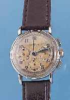 LEMANIA ARMBANDCHRONOGRAPH, REF.-NR. 9438, SCHWEIZ UM 1948, EDELST., BODEN U. GLASR. GE- DR., ORIG.-ZIFFERBL. FL., 30-MIN.-U. 12-STD.- ...