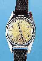 ZENITH HERRENARMBANDUHR, REF.-NR. 810336, SCHWEIZ UM 1937, METALL VERCHR., BODEN U. GLASR. GEDR., VERS. ORIG.-BLATT FL., GEBL. ...