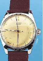 JUNGHANS HERRENARMBANDUHR MEISTER, REF.-NR. 10714, DEUTSCHLAND UM 1962, EDELST., BODEN GESCHR., VERS. ORIG.-BLATT FL., RUNDANKERW., 17 ST., ...