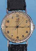OMEGA HERRENARMBANDUHR, REF.-NR. 2346/1, SCHWEIZ UM 1948, EDELST., BODEN U. GLASR. GEDR., D. CA. 35 MM, ORIG.-BLATT FL., 16 ST., ...