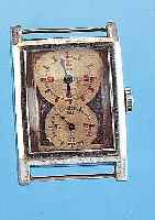 TIBET HERRENARMBANDUHR DOKTORS, SCHWEIZ UM 1934, METALL VERCHR., RECT.-FORM, BER., TYP. AUS DER MITTE GEZ. ZEIGERACHSEN FüR NORMAL- ZEIT U. ...