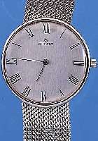 KONVOLUT: 2 HERRENARMBANDUHREN SCHWEIZER PRODUKTION, BEIDE EDELST. M. EDELST.-FLECHT-BäNDERN, BEIDE HANDAUFZUGKAL., BEIDE GEFERT. UM 1965, 1X ...