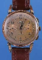 DELBANA ARMBANDCHRONOGRAPH, SCHWEIZ UM 1947,METALL M. RG-AUFL. BER., BODEN U. GLASR. GEDR., ORIG.-BLATT FARBL. GET., 30-MIN.-STOPP-ZäHLER, 17 ...
