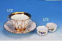 TASSE MIT UNTERTASSE, MEISSEN, UM 1850-55, PORZELLAN, REICH RELIEFIERT UND VERGOLDET, H. CA. 6,5 CM