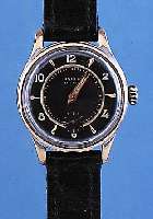 UNIVERSAL HERRENARMBANDUHR MODELL ANKER, REF.-NR. 31230, SCHWEIZ UM 1950, METALL VER- CHR./BER., EDELST.-SCHR.-BODEN M. SELTENER UNIVERSAL ...