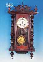WANDUHR MIT VIERTELSTUNDENSCHLAG, FRANKR., UM 1900, VERZIERTES HOLZGEHäUSE, ALTER WURMBE- FALL, AUFSATZ SEK., 3-SEITIG VERGLAST, 2-GE- TEILTES ...